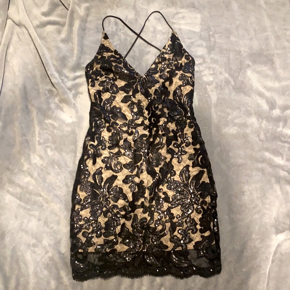 AKIRA Dresses & Skirts - Black and Nude colored spaghetti strap dress.